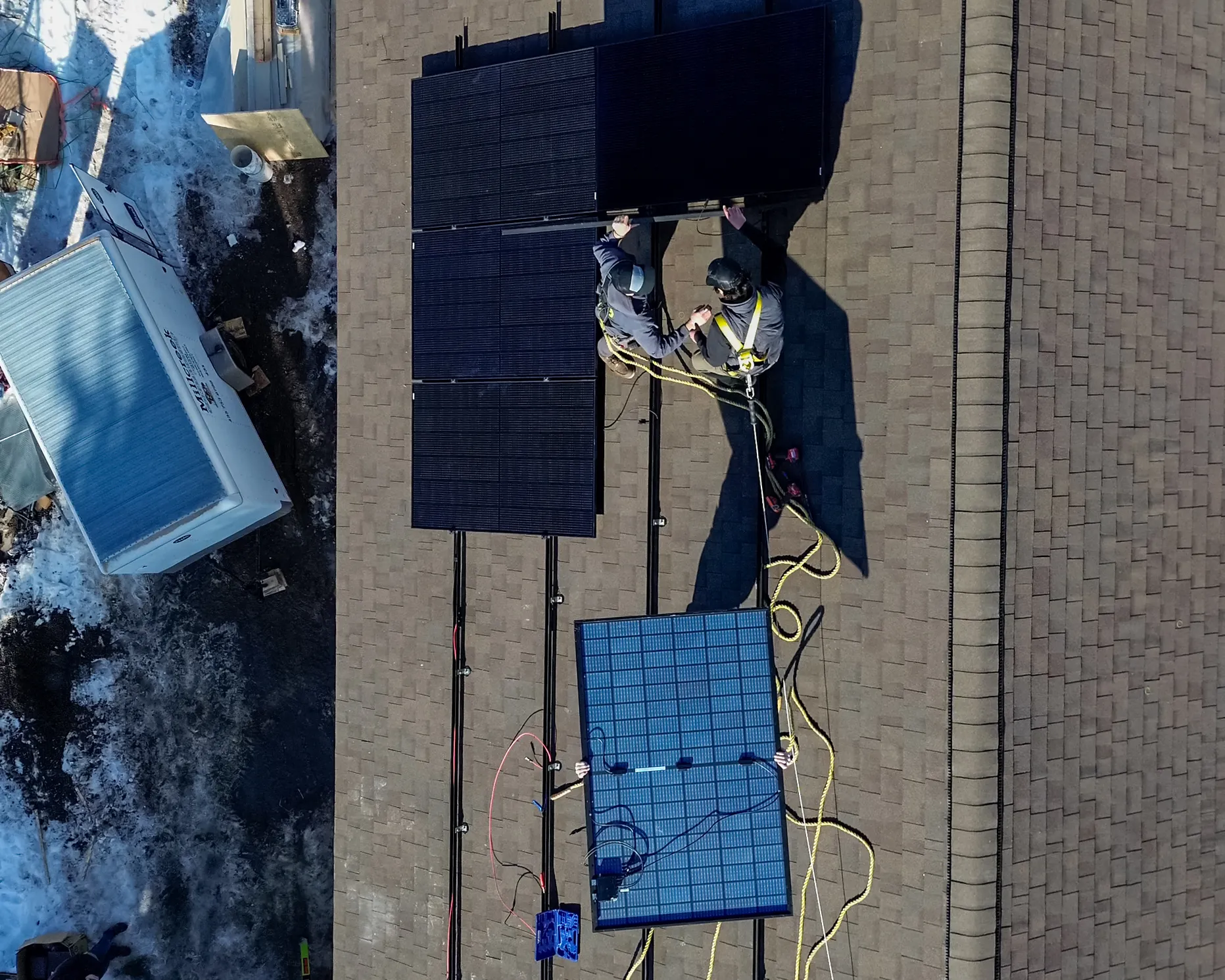 Green Box Solar installation crew on a residential roof