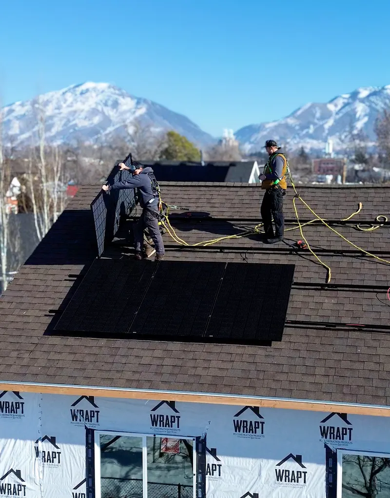 Our licensed installers on a residential roof